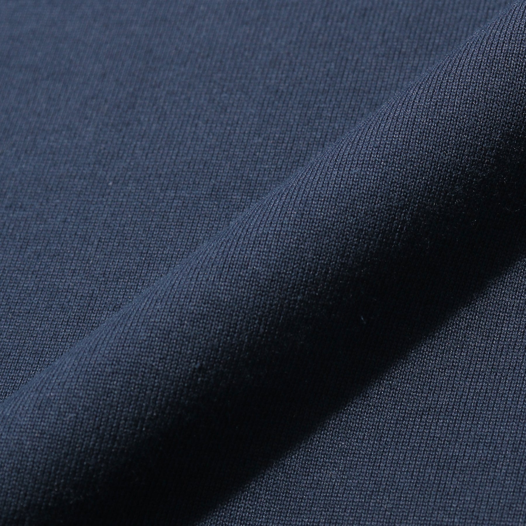 ハイブリッドコットンバスクシャツネイビーの生地を写した商品画像