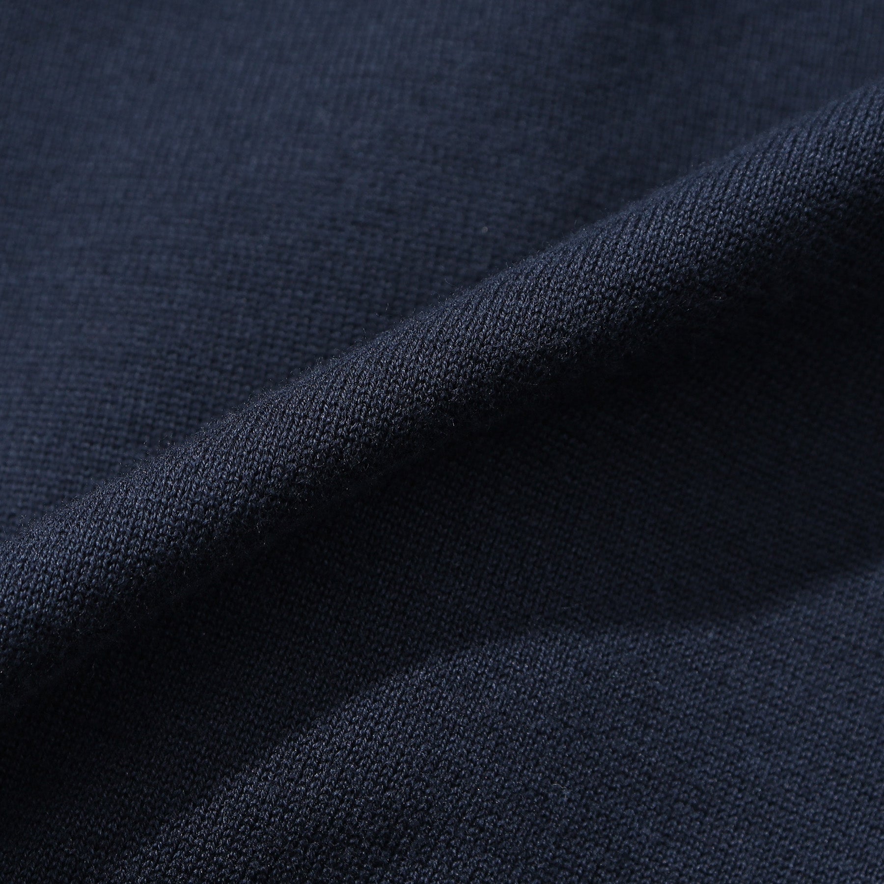 スビンプラチナムニットフーディネイビーの生地を写した商品画像