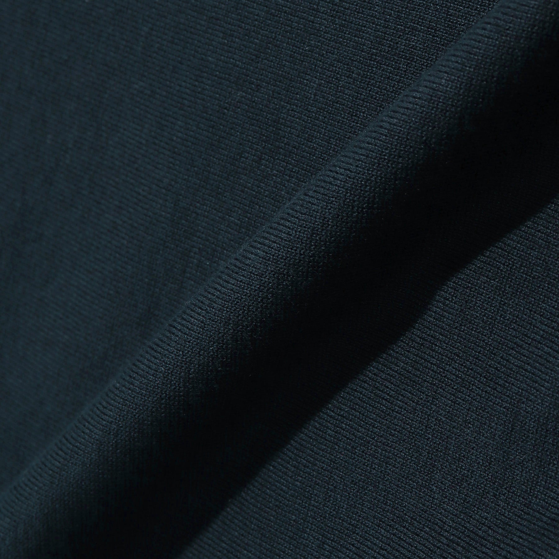 スビンプラチナムスキッパーニットネイビーの生地を写した商品画像