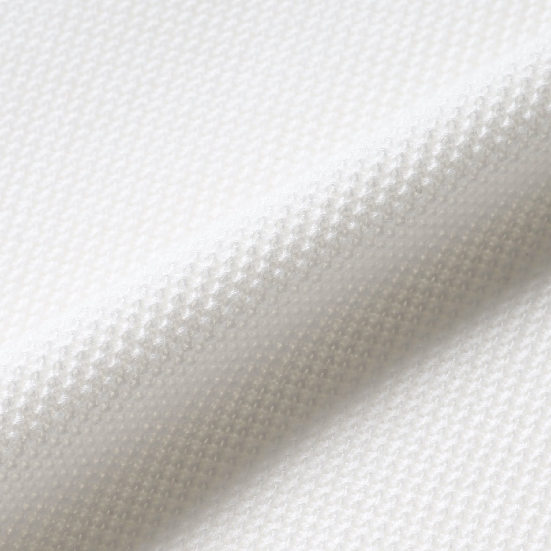 スビンプラチナムサーマルニットホワイトの生地を写した商品画像